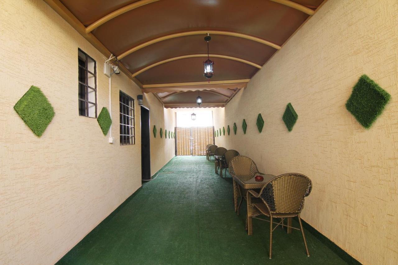هذا منزلى الحمراء Riaad Buitenkant foto